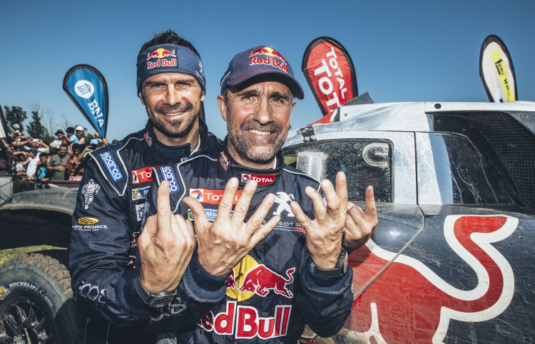 Stephane Peterhansel (FRA) and Cyril Despres (FRA) from Team Peugeot Total at the finish line of stage 13 of Rally Dakar 2016 from Villa Carlos Paz to Rosario, Argentina on January 16, 2016.